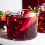 Bachelor's jam poured over ice garnished with berries