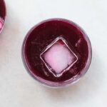 homemade beet kvass in a glass with ice