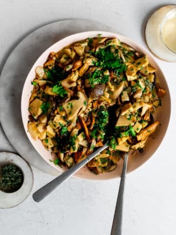 braished wild mushrooms in a pink bowl