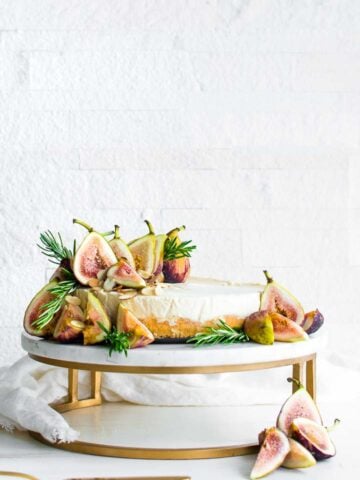 fresh fig tart on a stand