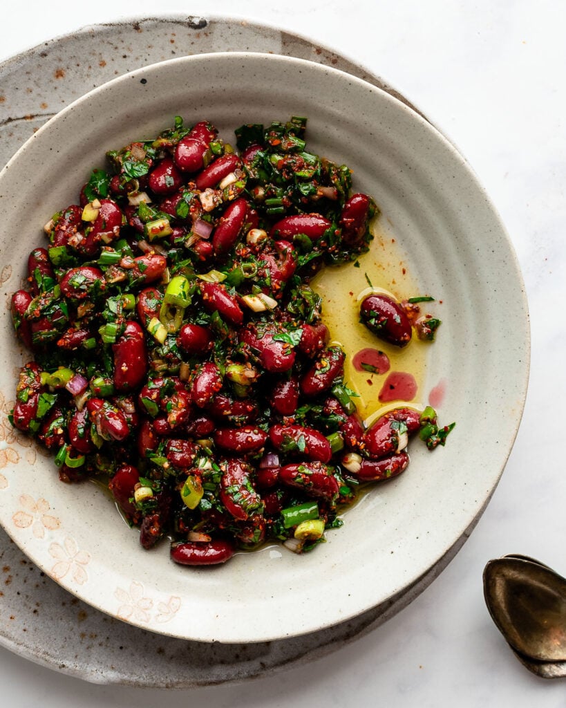 marinated kidney beans in an earthenware dish